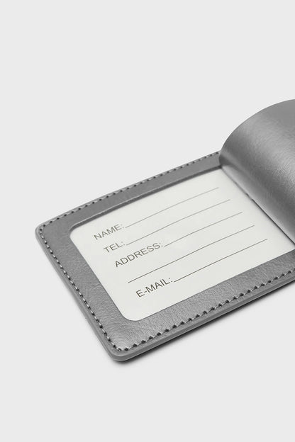 GRAY "VOYAGER" SUITCASE TAG