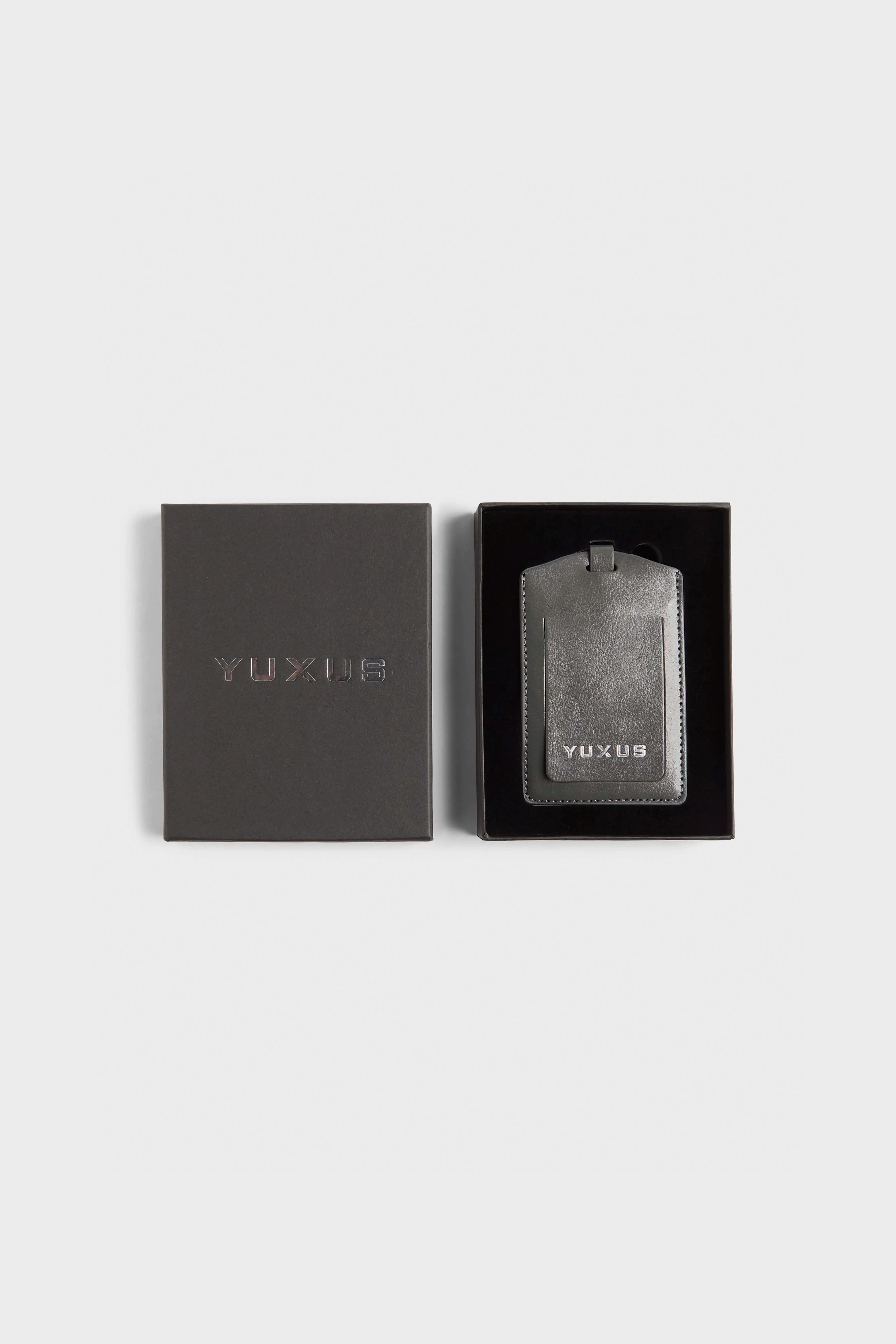 GRAY "VOYAGER" SUITCASE TAG